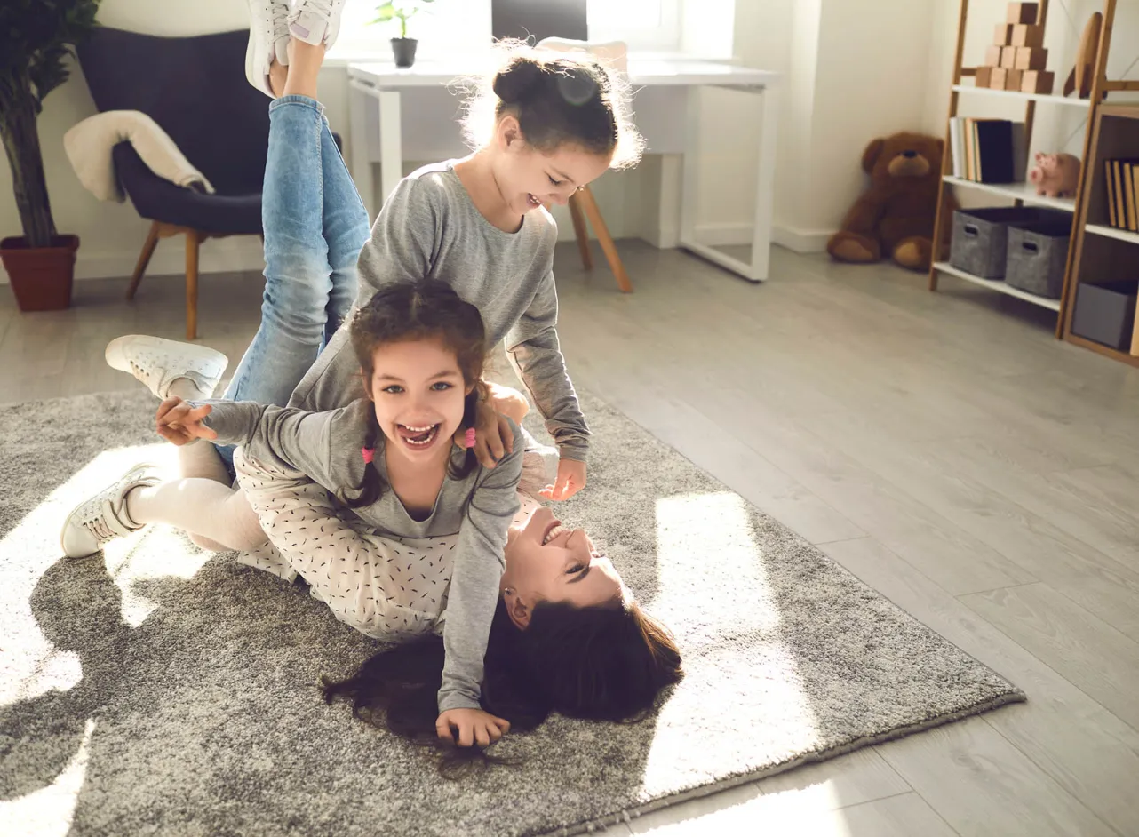 happy children play with mother